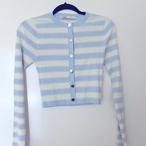 Gently worn cropped cardigan sweater. Metal button detail. 100% cotton.